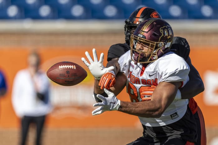Jan 31, 2024; Mobile, AL, USA; National tight end Brevyn Spann-Ford of Minnesota (88) fights off National defensive back Kitan Oladapo of Oregon State (28) for a pass during practice for the National team at Hancock Whitney Stadium. Mandatory Credit: Vasha Hunt-USA TODAY Sports